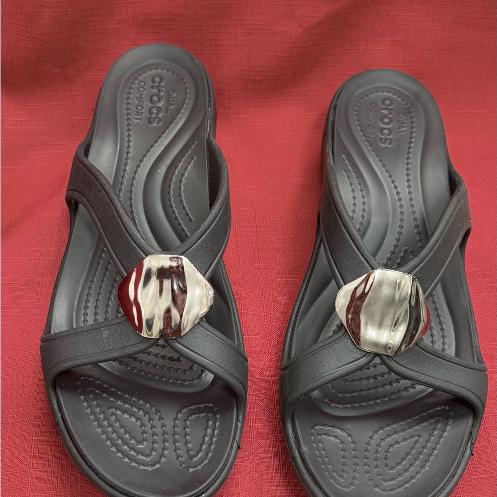 CROCS Women's Black Slide Sandals with Silver Marbled Accent.